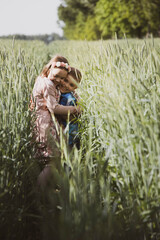 Children's Day, kids, brother and sister together  - summertime - holidays - girl and boy on the field, close to nature, countryside