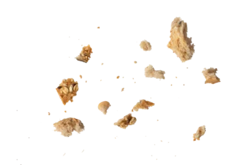 Poster Crumbs of fresh whole grain bread isolated on white background. Isolate crumbs of different sizes for insertion into a design or project. © SERSOLL
