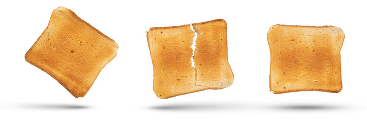 A set of golden slices of bread from a medium rare toaster on a white isolated background. Slices...