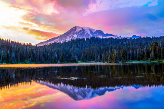Colorful mountain sunset in mountain over a lake