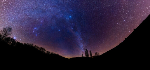 astrophotography of the winter milky way in the mountains