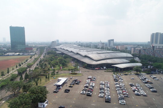 Tangerang, Indonesia : August 11, 2020 aerial photo drone of building ICE Convention Exhibition in BSD City Tangerang Indonesia. highways, car parks, people passing by