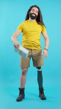 Man with a leg prosthesis delivering a gift