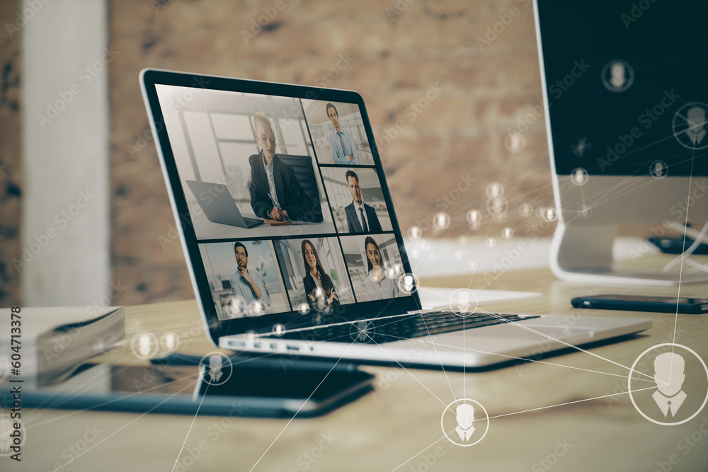Poster close up of laptop on desk with glowing video conference hologram and polygonal connections on blurr