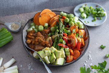 Buddha bowl with healthy vegetables served on plate