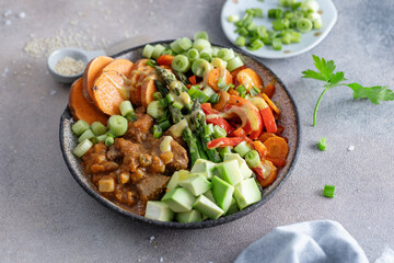 Buddha bowl with healthy vegetables served on plate
