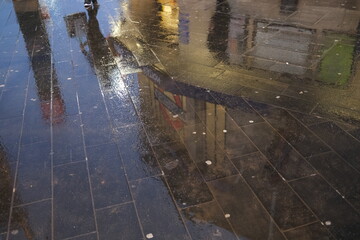 rain on the street - london underground station