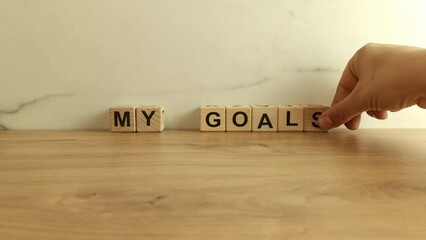 Text my goals made of wooden blocks. Business strategy, motivation concept