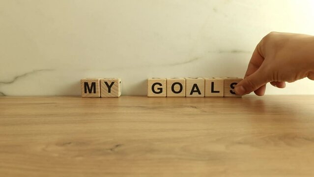 Text my goals made of wooden blocks. Business strategy, motivation concept