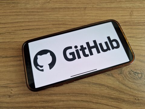 GitHub logo displayed on mobile phone