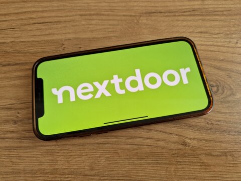 Nextdoor logo displayed on mobile phone
