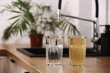 House water filtration system to drinkable condition. Glass of clear water after reverse osmos...