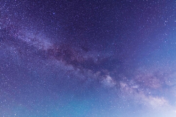 Beautiful starry night. Bright Milky Way galaxy sky. Starry sky background.