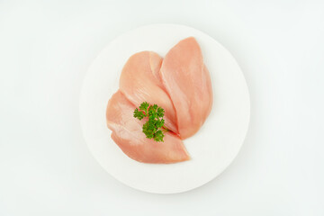 Chicken breast Fillets.Close up.Raw chicken meat.Raw fresh chicken fillet light background with fresh herbs.Food for retail.Procurement for designers.Ogranic food,healthy eating.Food concept.Top view.