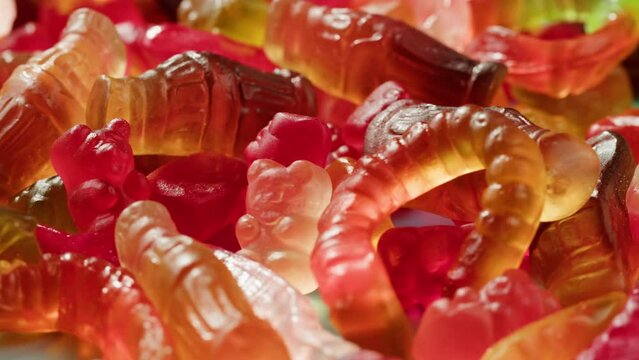 Jelly marmalade cola bottle bear close up, Confiture Bean candy jujube Marmalade bears with cod cannabis close up. 
