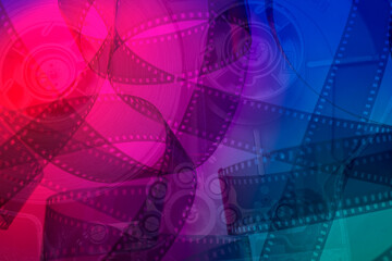 Obraz premium abstract color background with film strip and movie camera cassette mechanism. film production film festival concept background banner
