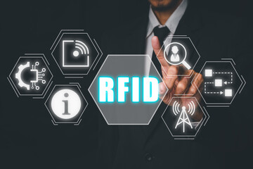RFID, Radio frequency identification concept, Businessman hand touching Radio frequency...