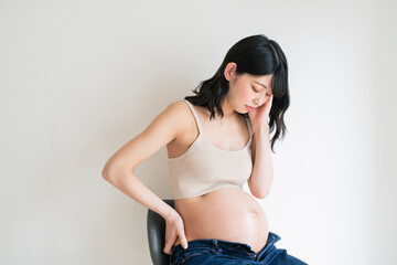 体調の悪そうな妊婦