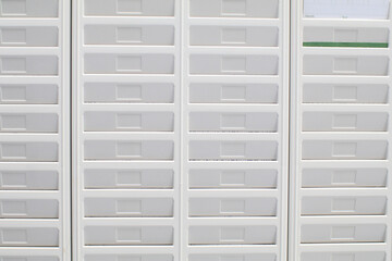 Vintage time working punching card wall for employee to fill their cards. Wallpaper and texture.