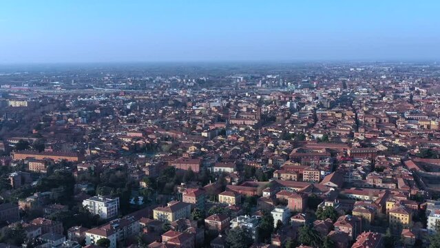 Aerial pan video of Bologna city center at sunset, Emilia Romagna, Italy