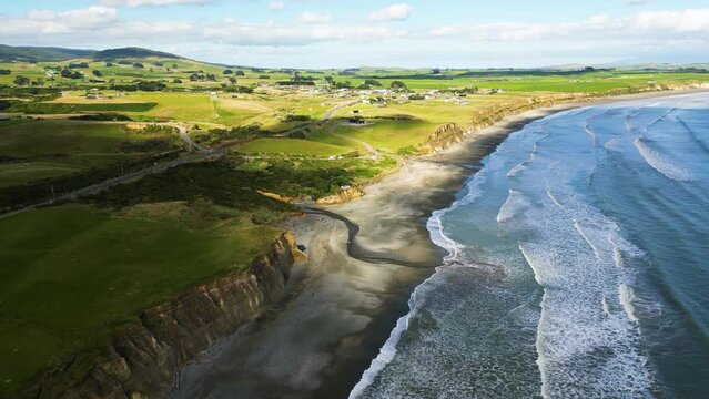 Calm ocean wave on stunning Gemstone beach, New Zealand, aerial panorama