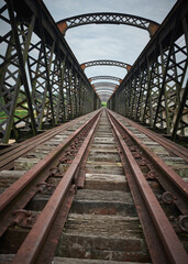 Fototapeta na wymiar Old railway bridge, vintage metal railway bridge