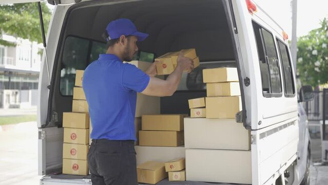 The postman delivered the parcel home with a smile and a happy face at the door. Home Delivery Concept Parcel Delivery 4k Video