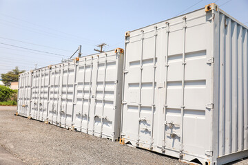 Shipping container: a symbol of global trade, efficiency, and interconnectedness, representing the movement of goods and economic globalization