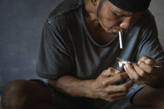 Close Up  man is taking heroin, Drug addict, Disease , No to drugs,The concept of anti drugs,  26 June International Day Against Drug abuse.