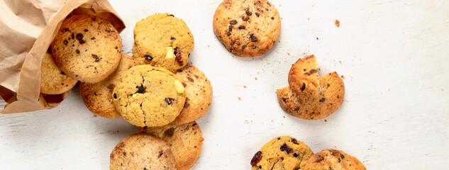 National Cookie Day with yummy freshly chocolate chip cookies on a white background. Top view.