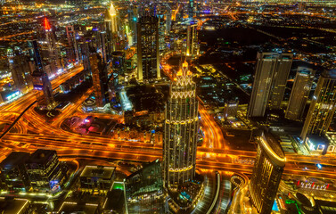 Downtown Dubai at night. Scenic aerial view on highways and skyscrapers