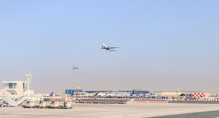 View from the window of a Flydubai aircraft moving along the runway to the standing planes of world...