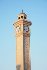 clock tower against blue sky ,