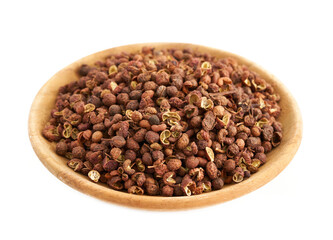 Sichuan peppercorn pepper spice seed in wood bowl isolated on white background. pile of Sichuan peppercorn pepper spice seed. Sichuan peppercorn pepper spice seed                              