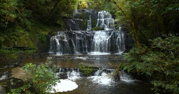 Waterfall in pristine native forest wilderness of New Zealand South Island
