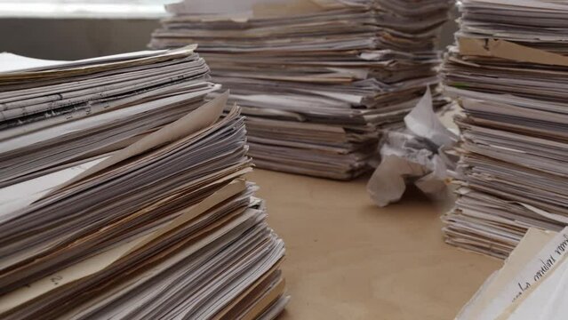 Stack business paper on desk, paperwork in office. Printer and photocopier paper