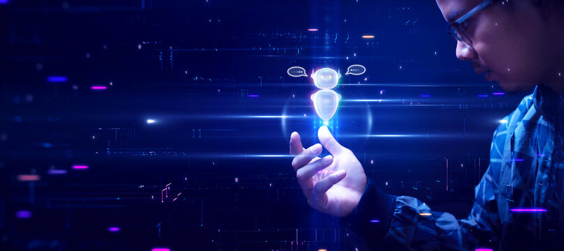AI Chat Bot technology concept. Asian men are looking at the coming of artificial intelligence technology or AI that will change the world. The smart assistant automatically replies to conversations.