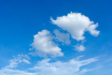 Naklejka na ściany i meble Cirrus and cumulus clouds on blue sky background.