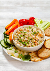 salmon salad with fresh veggies and crackers
