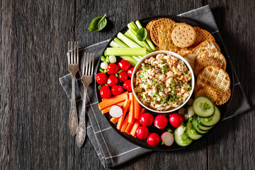 salmon salad with fresh veggies and crackers