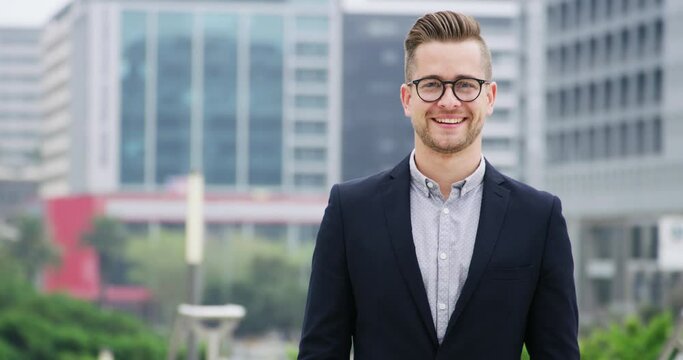 Happy business man, city and face of confidence, professional commitment and pride of corporate ambition. Portrait, entrepreneur and young male worker in town with suit, glasses and smile in New York