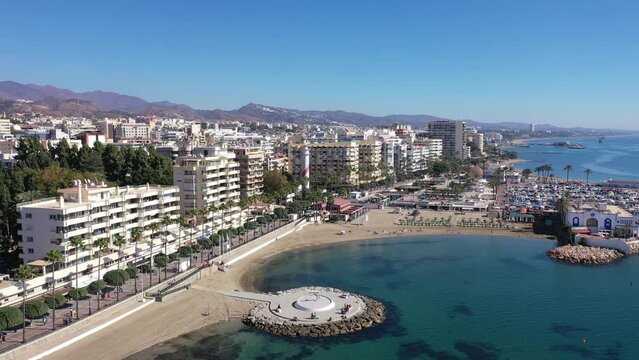  Aerial drone perspective of beautiful over luxury Puerto Banus Bay in Marbella, Costa del Sol. Spain