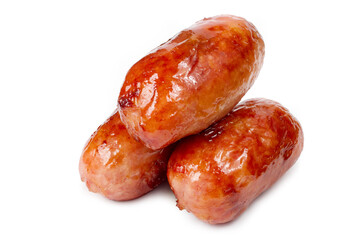 Fresh fried sausages on a white background. Fried sausages made from natural meat.