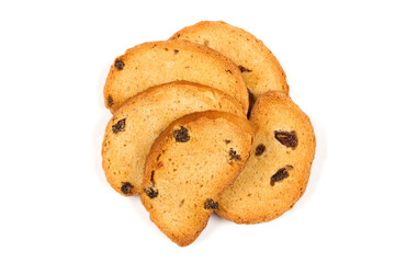 Sweet crackers with raisins on a white background. A bunch of crackers close-up.