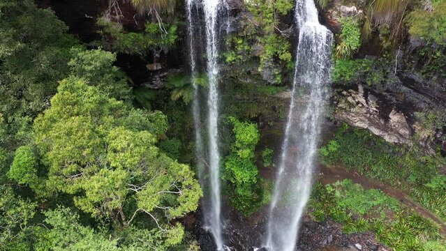 Aerial decend to the bottom of Twin Falls. Springbrook National Park, Gold Coast hinterland