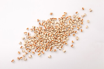 Job's tears or adlay millet seeds isolated on white background , top view , flat lay.