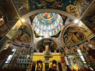 Perspective looking up to the detailed underside of the dome in an orthodox church with beautiful...