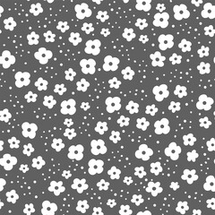 Obraz premium Cute vector pattern. White daisies on a dark gray background. Cheerful children's background 