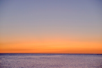 Obraz premium Background with sea on the sunset, space for text.