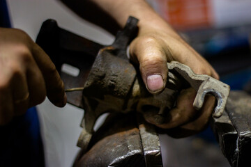 blacksmith working in a workshop
